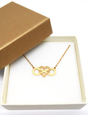Edelstahlcollier "Unendlichkeitsschleife m.Herz" gold inkl. Etui