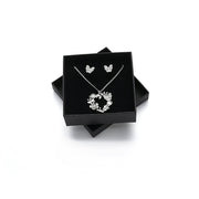 Garnitur "Schmetterlinge" rhodiniert     Katzenauge/Kristall  inkl. Etui